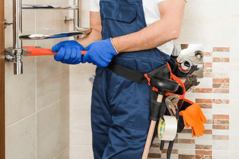 Crop plumber using wrench Crop plumber using wrench